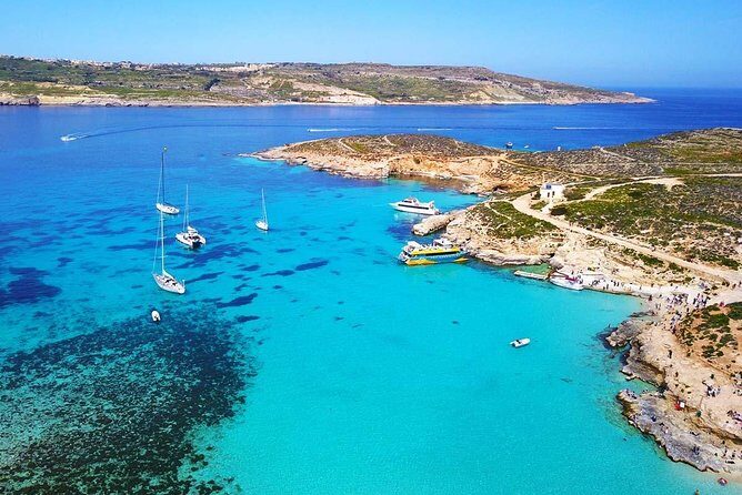 Blue Lagoon, Beaches and Bays Catamaran Sailing Tour - Onboard comfort: nets, sunbeds, and the reality of first-come seating