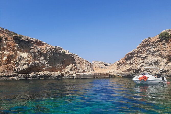 Boat Charters Blue lagoon, Crystal Lagoon, Comino, Malta 4hr trip - Passing St Mary’s tower and Elephant Head Rock: movie-meets-Malta moments