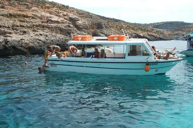 Comino and Gozo Private Boat Tour : Julie Pearl Boat - Santa Maria Bay: a calmer Comino beach for slower moments