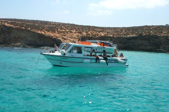 Comino and Gozo Private Boat Tour : Julie Pearl Boat - Crystal Lagoon: caves, snorkeling masks, and movie-location vibes
