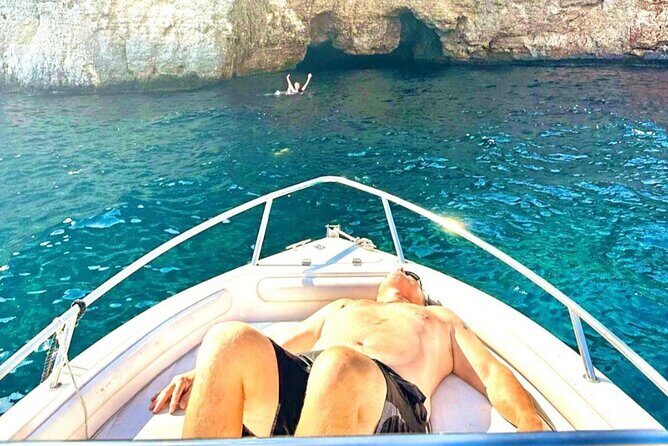 Comino Private Boat Tour in Malta - Cominotto Reef: the small sandy pocket and a cave swim through