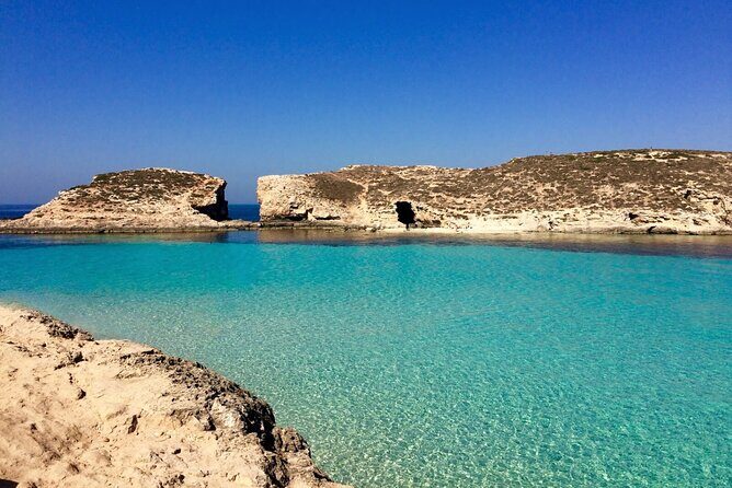 Comino Private Boat Tour in Malta - Crystal Lagoon: sheltered water, changing blue tones, and cliff-jump energy