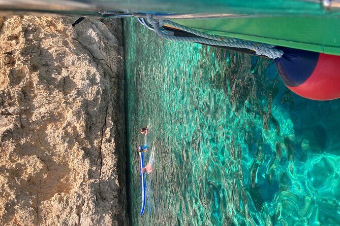 Comino Private Boat with Snorkeling and Cave Sightseeing - Crystal Lagoon: snorkeling, two caves, and the Saint Mary tower view