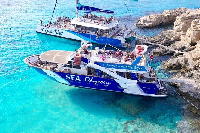 Gozo & Comino Islands, Blue Lagoon & Seacaves Tour - The catamaran ride: views, sea caves, and a statue sightline