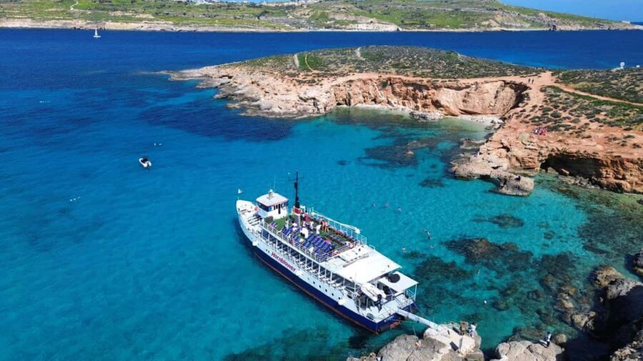 Malta: Comino, Blue Lagoon, Crystal Lagoon & Caves Cruise - The 10m Water Slide, Deck Chairs, and On-Board Comforts