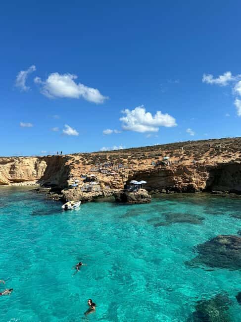 Malta: Gozo, Comino, Blue & Crystal Lagoon, & Caves Cruise - The short photo stops on the return: Crystal Lagoon and St Mary’s Tower
