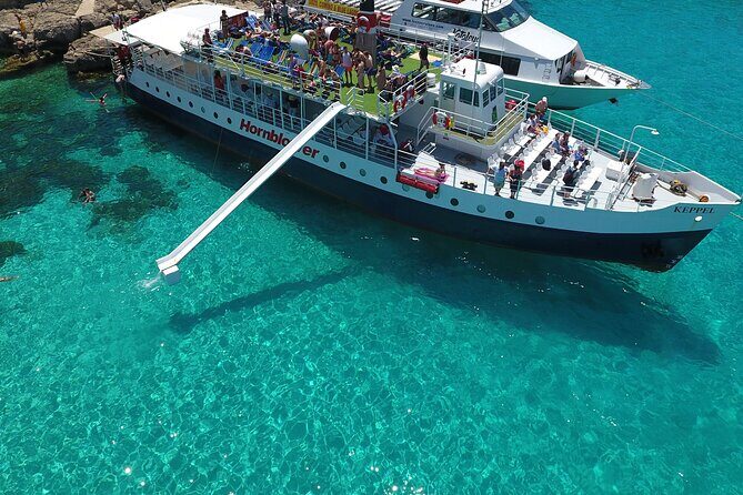 Malta Sunset Boat Tour: Bugibba to Comino Blue Lagoon Cruise - Food and drinks onboard: good value, easy ordering, and real variety