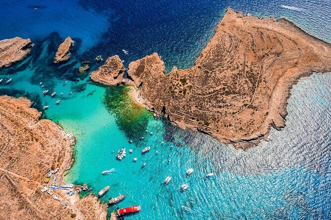 Turkish Gullet Cruise to Gozo and Comino with Lunch and Transfers - Crystal Lagoon and Comino Caves: what the optional €15 speedboat actually buys